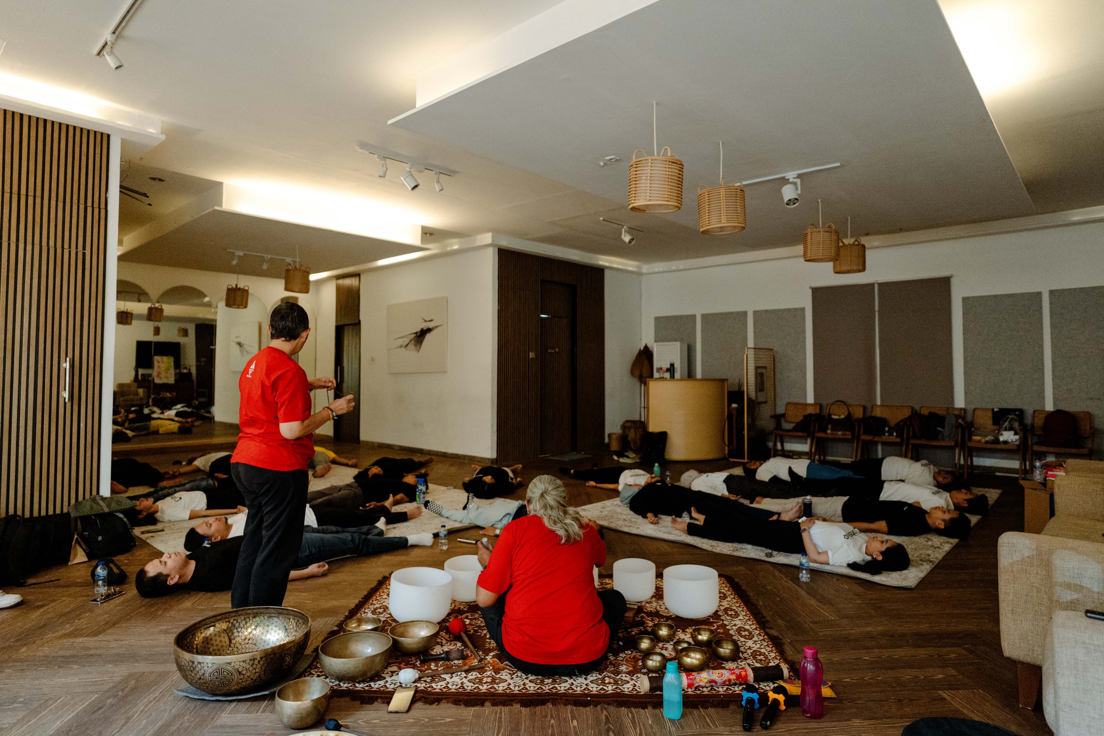 Coworkers sharing a sound bath session